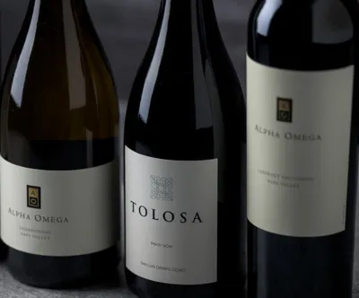 Alpha Omega Collective wine bottles